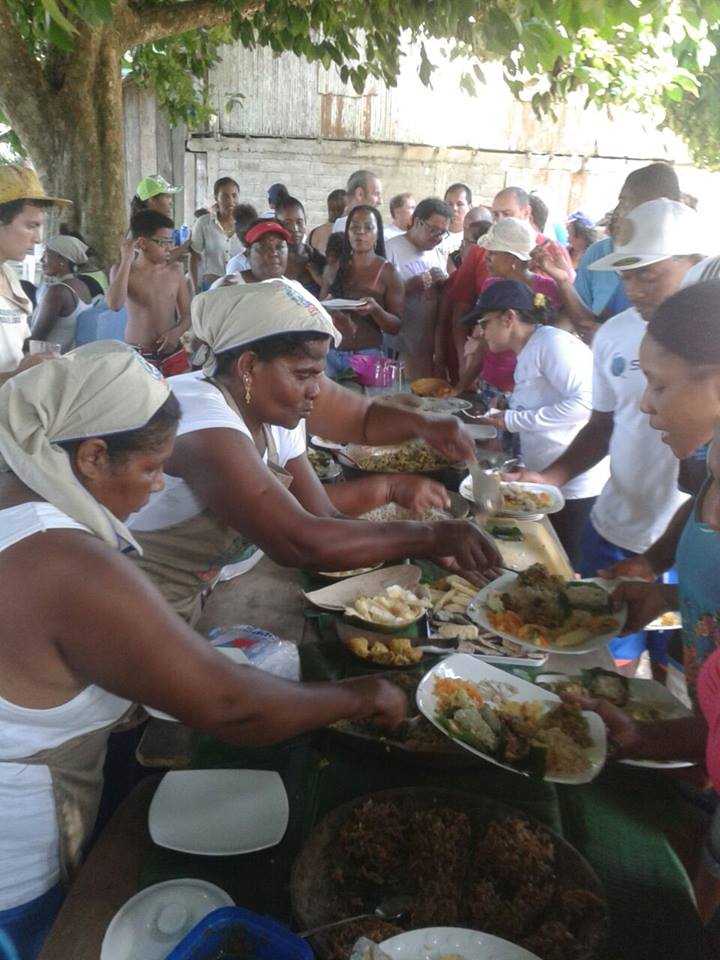 Community members and invited guests gather in 2012 to discuss food, health, and sustainability.